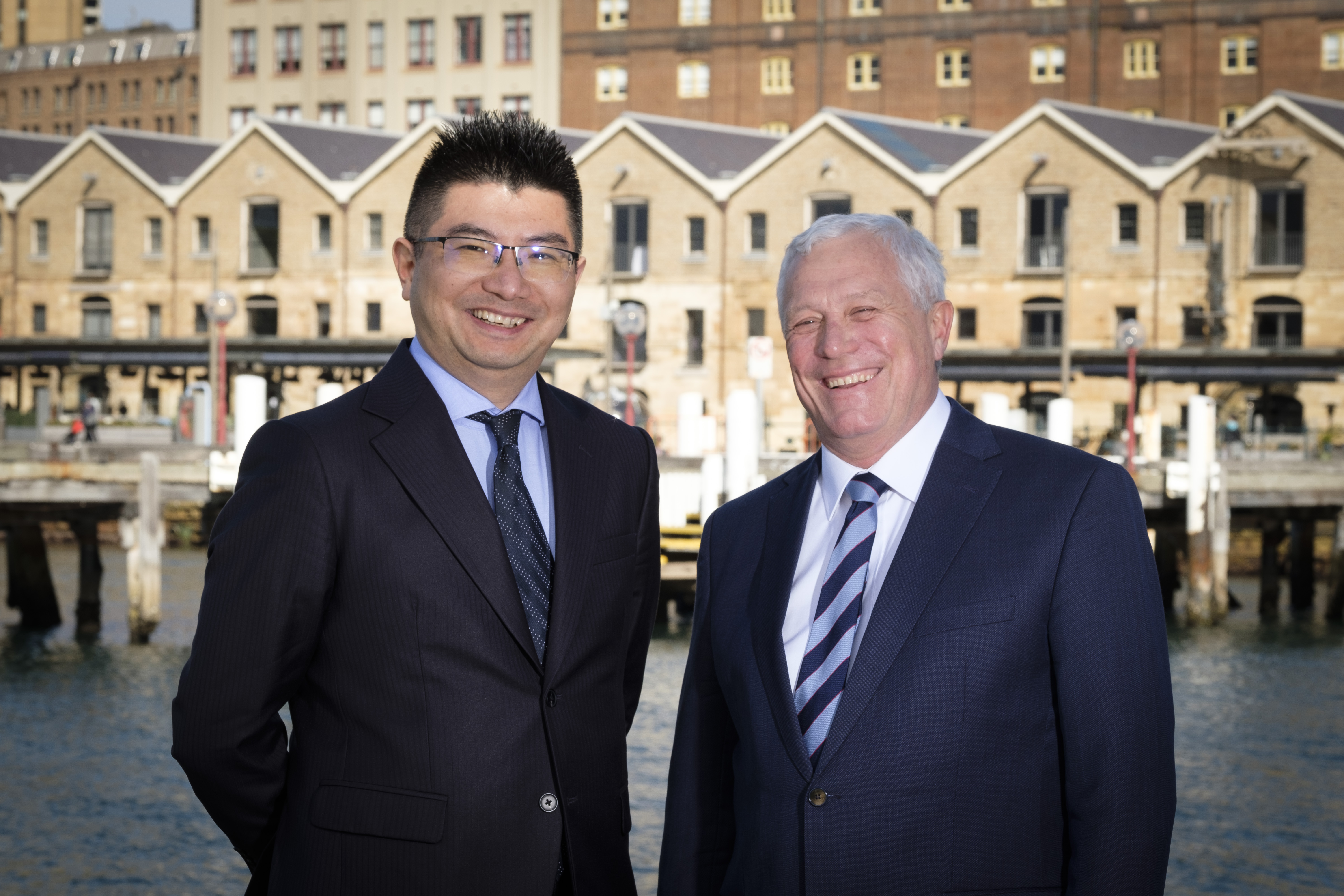 Moomoo Australia head Biyi Cheng (left) with chief commercial officer Michael McCarthy (right)